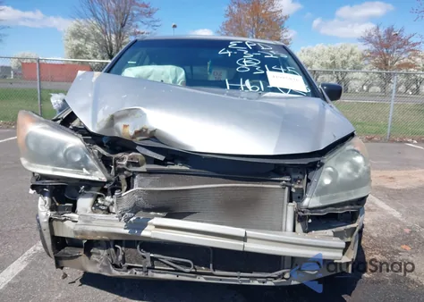 2009 Honda Odyssey Lx z USA, uszkodzony, nr VIN 5FNRL38209B003145